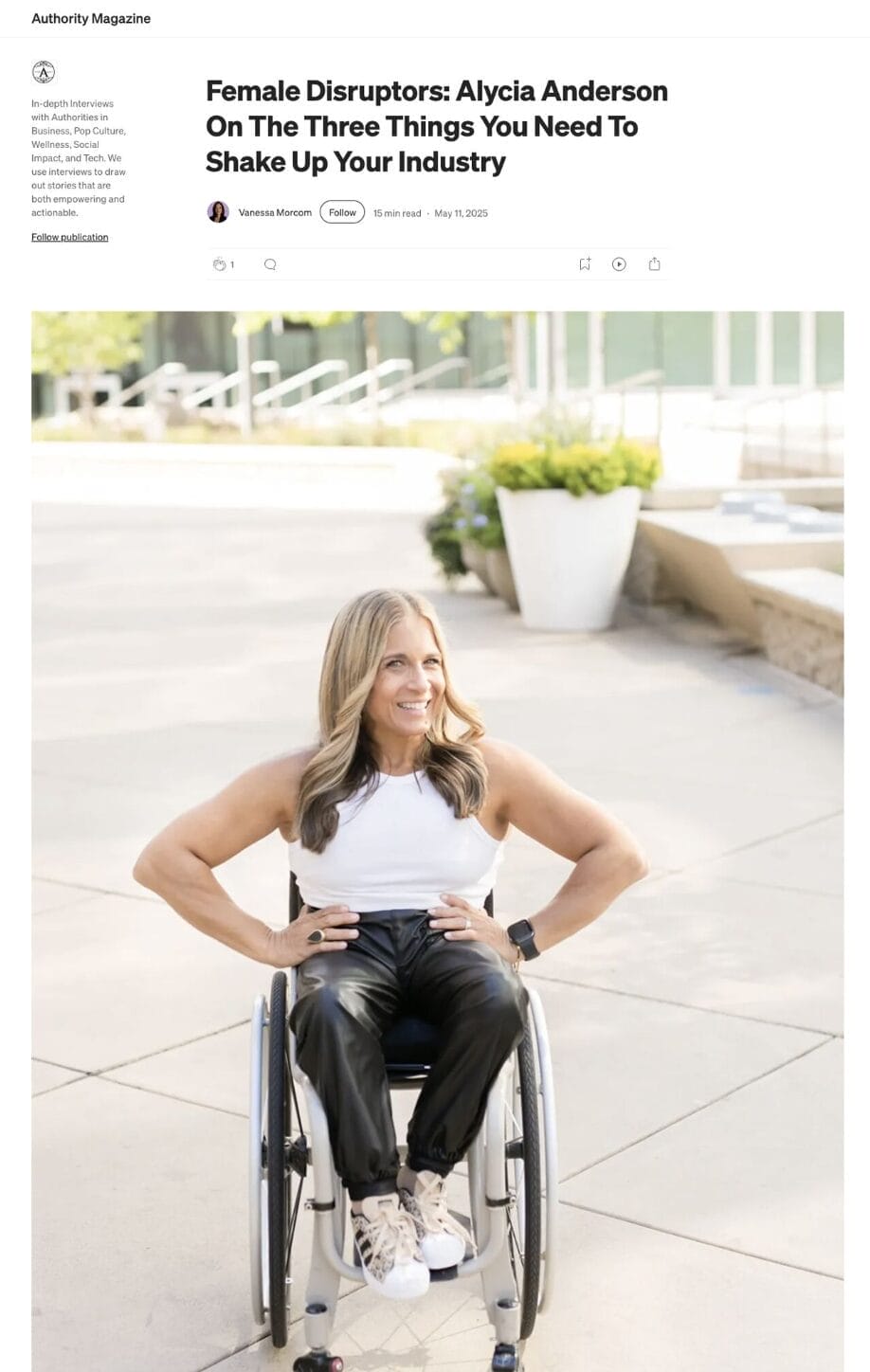 Image Description: Alycia sitting in a wheelchair with hands on hips, wearing black and white, featured in Authority Magazine article titled “Female Disruptors: Alycia Anderson On The Three Things You Need To Shake Up Your Industry” by Vanessa Morcom, May 2025. Medium